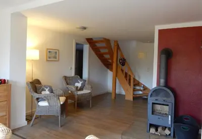 Ein Sitzbereich in der Unterkunft Ferienhaus Am Nordstrand