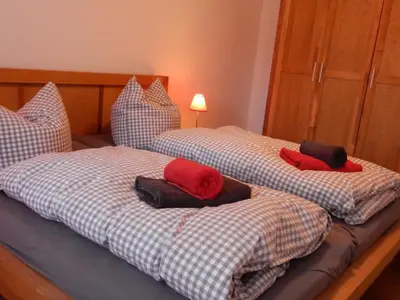 Ein Bett oder Betten in einem Zimmer der Unterkunft Ferienhaus Am Nordstrand