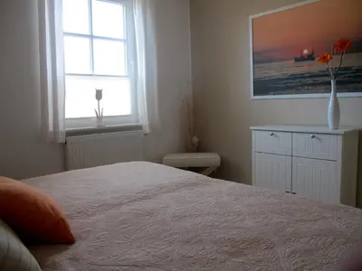 Ein Bett oder Betten in einem Zimmer der Unterkunft Wiesenstraße 55 Whg 2 - Strandbuhne