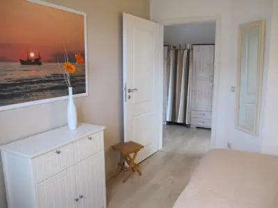Ein Bett oder Betten in einem Zimmer der Unterkunft Wiesenstraße 55 Whg 2 - Strandbuhne