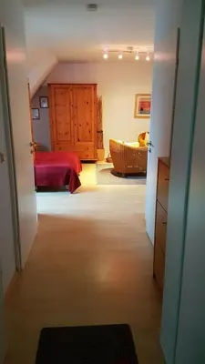 Ein Bett oder Betten in einem Zimmer der Unterkunft Birkenstraße 15b App 14