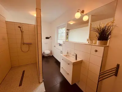 Ein Badezimmer in der Unterkunft Ferienhaus De niege Leive