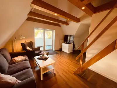 Ein Sitzbereich in der Unterkunft Ferienwohnung de olle Leive in Born