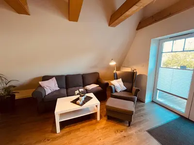Ein Sitzbereich in der Unterkunft Ferienwohnung de olle Leive in Born