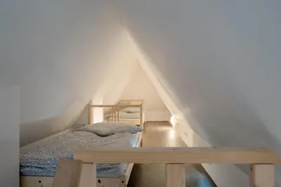 Ein Bett oder Betten in einem Zimmer der Unterkunft Ferienwohnung de olle Leive in Born