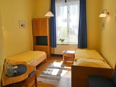 Ein Bett oder Betten in einem Zimmer der Unterkunft Gut Nisdorf - Bio Urlaub an der Ostsee
