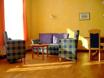 Ein Sitzbereich in der Unterkunft Gut Nisdorf - Bio Urlaub an der Ostsee