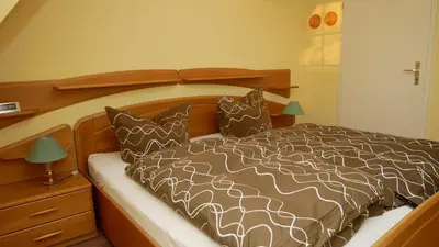 Ein Bett oder Betten in einem Zimmer der Unterkunft Haus 