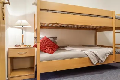 Ein Bett oder Betten in einem Zimmer der Unterkunft Stürmann
