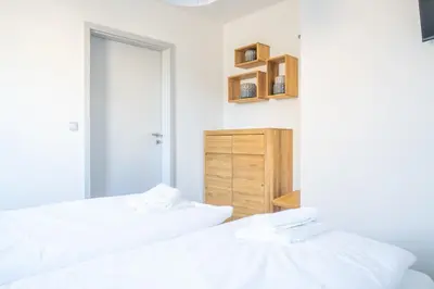 Ein Bett oder Betten in einem Zimmer der Unterkunft Kranichhus - Kranich 1