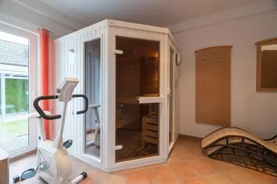 Das Fitnesscenter und/oder die Fitnesseinrichtungen in der Unterkunft Villa Dünenblick 01