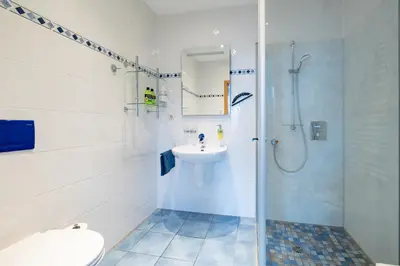 Ein Badezimmer in der Unterkunft Villa Dünenblick 01