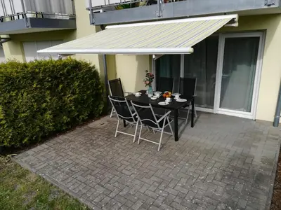 Ein Patio oder anderer Außenbereich in der Unterkunft Zum Strandkorb