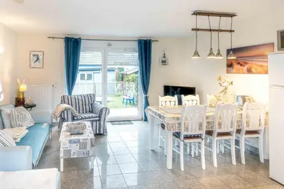 Ein Sitzbereich in der Unterkunft Ferienhaus Kranich