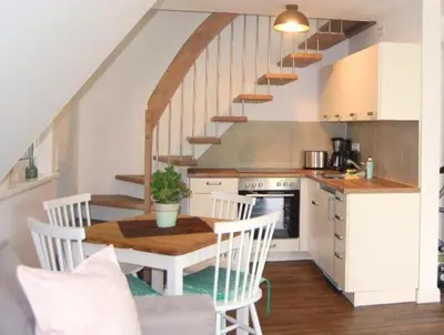 Küche/Küchenzeile in der Unterkunft Darßer Strandgut - Haus Ahrenshooper Holz