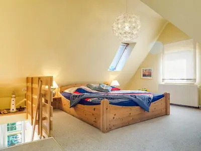 Ein Bett oder Betten in einem Zimmer der Unterkunft lütt Matten
