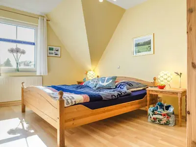 Ein Bett oder Betten in einem Zimmer der Unterkunft lütt Matten