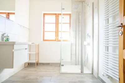 Ein Badezimmer in der Unterkunft Holzkate