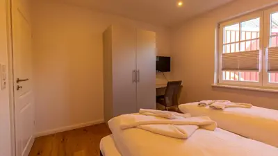 Ein Bett oder Betten in einem Zimmer der Unterkunft Haus Theresa