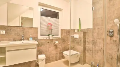 Ein Badezimmer in der Unterkunft Mühlenhaus - Kornstube