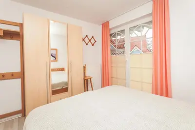 Ein Bett oder Betten in einem Zimmer der Unterkunft Fritz-Reuter-Straße 2 Whg 2