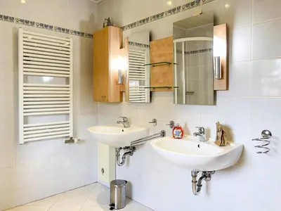 Ein Badezimmer in der Unterkunft Darßwaldradler