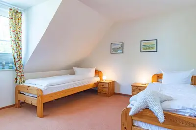Ein Bett oder Betten in einem Zimmer der Unterkunft Darßwaldradler