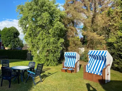 Ein Garten an der Unterkunft Darßwaldradler