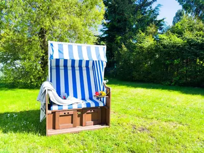 Ein Garten an der Unterkunft Ostseeschwimmer