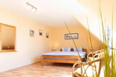 Ein Bett oder Betten in einem Zimmer der Unterkunft Weststrandläufer