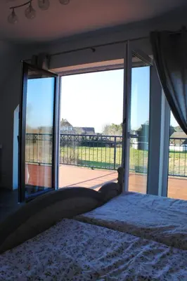 Ein Bett oder Betten in einem Zimmer der Unterkunft Ferienhaus Harmonia