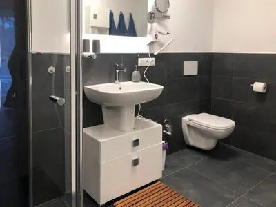 Ein Badezimmer in der Unterkunft Sterntaucher 04