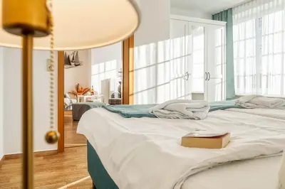 Ein Bett oder Betten in einem Zimmer der Unterkunft Pension Linde Prerow