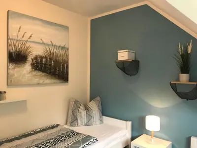 Ein Bett oder Betten in einem Zimmer der Unterkunft Schwalbennest