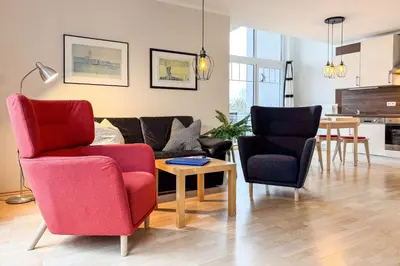 Ein Sitzbereich in der Unterkunft Villa Seeluft, No 8