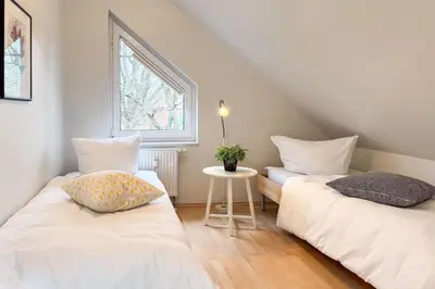 Ein Bett oder Betten in einem Zimmer der Unterkunft Villa Seeluft, No 8