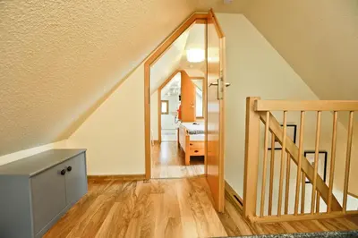 Ein Bett oder Betten in einem Zimmer der Unterkunft Ferienzeit