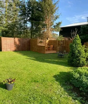 Ein Garten an der Unterkunft Ferienwohnung An den Tannen