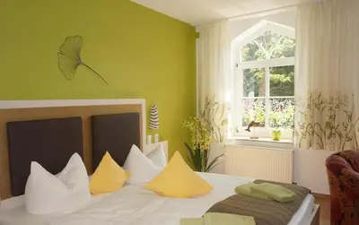 Ein Bett oder Betten in einem Zimmer der Unterkunft Apartments der 