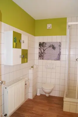 Ein Badezimmer in der Unterkunft Apartments der 