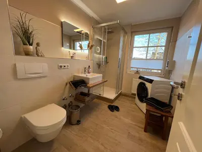 Ein Badezimmer in der Unterkunft Ferienwohnung SÜN