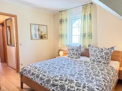 Ein Bett oder Betten in einem Zimmer der Unterkunft Reethus Natalie