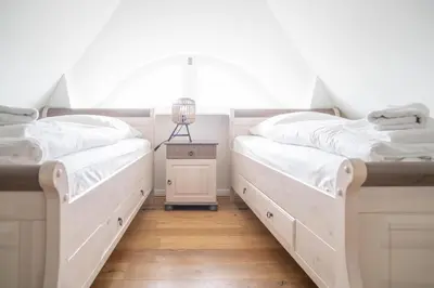 Ein Bett oder Betten in einem Zimmer der Unterkunft Jade 4
