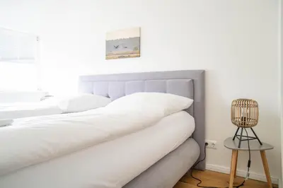 Ein Bett oder Betten in einem Zimmer der Unterkunft Jade 4