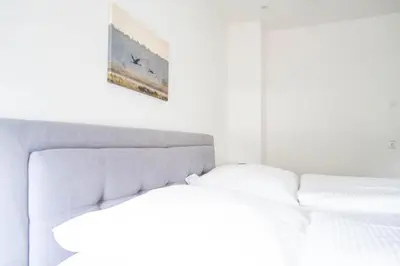 Ein Bett oder Betten in einem Zimmer der Unterkunft Jade 4