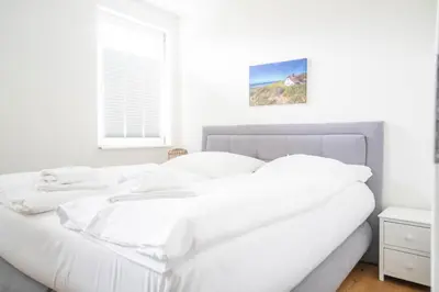 Ein Bett oder Betten in einem Zimmer der Unterkunft Jade 4