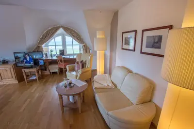 Ein Sitzbereich in der Unterkunft Romantik Hotel Namenlos