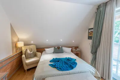 Ein Bett oder Betten in einem Zimmer der Unterkunft Romantik Hotel Namenlos