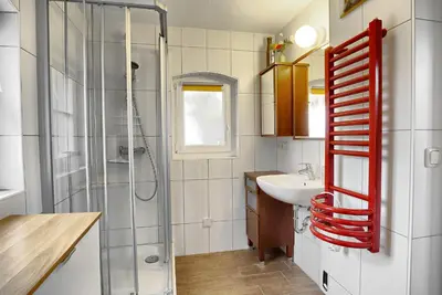 Ein Badezimmer in der Unterkunft Remise