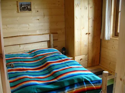 Ein Bett oder Betten in einem Zimmer der Unterkunft Horse Lake Ranch